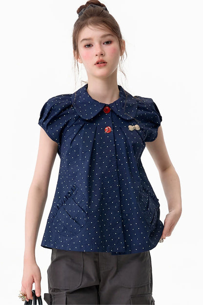 Camicia blu scuro a pois con colletto Peter Pan