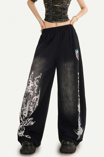 Pantaloni sportivi a gamba larga con stampa grafica