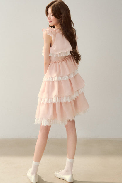 Robe rose à volants superposés en dentelle cils avec nœud