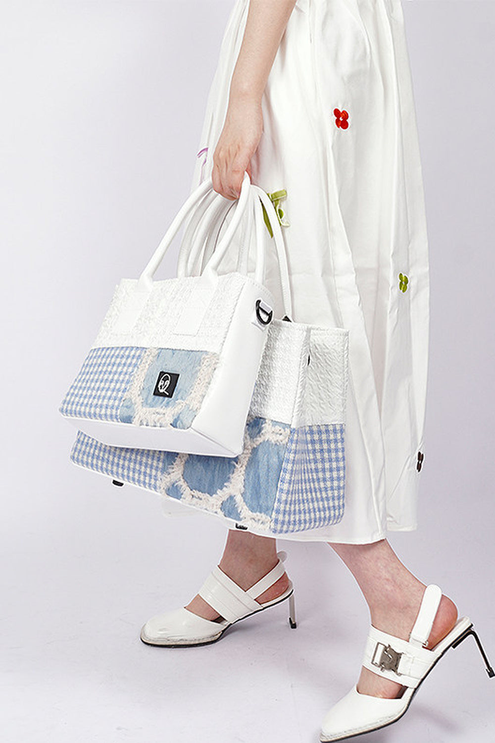 Borsa tote quadrata piccola a toppe con cuciture