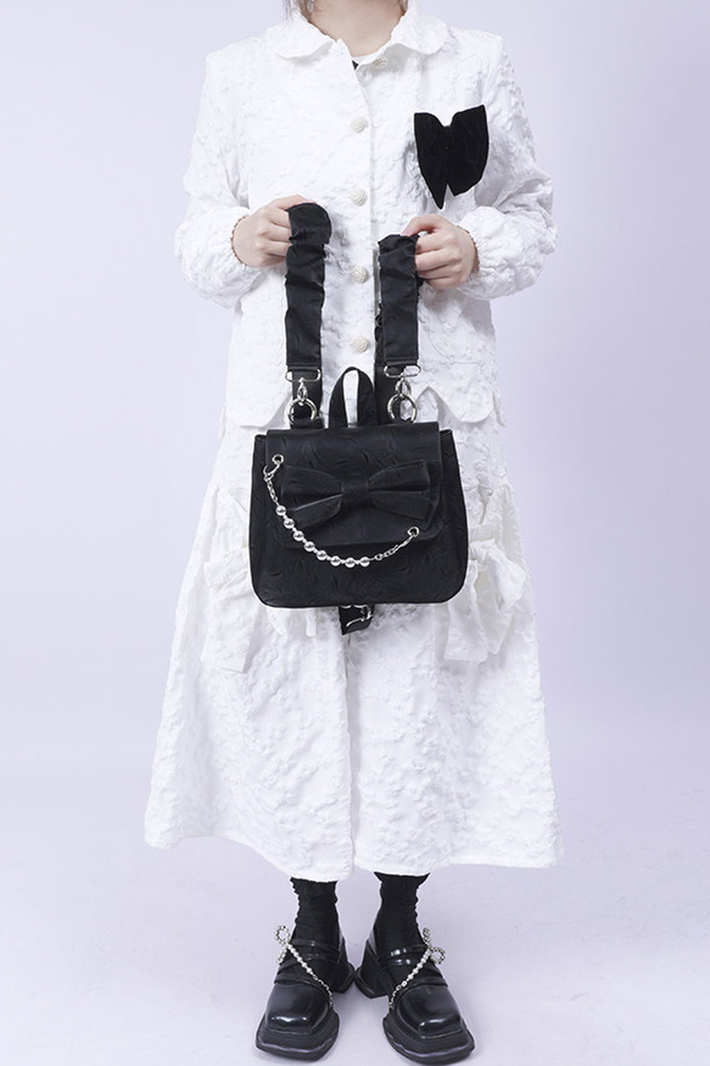 Silver Bow Crossbody Backpack