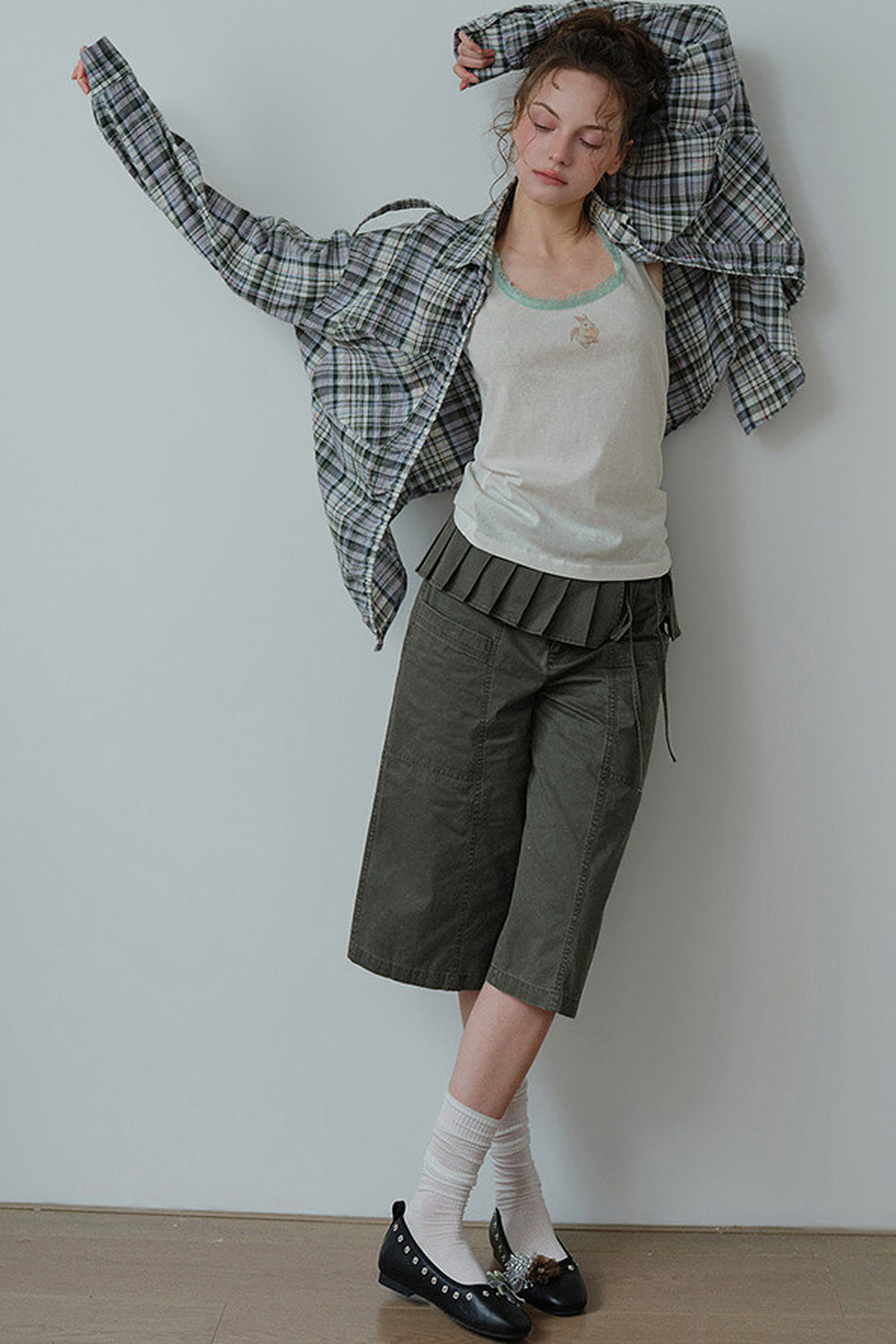 Pantaloni cropped a vita alta con orlo plissettato staccabile