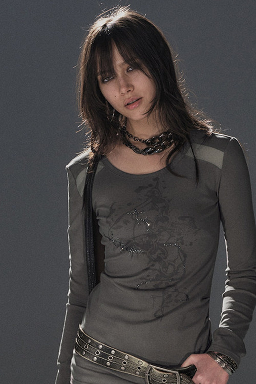 Top in mesh bicolore con strass