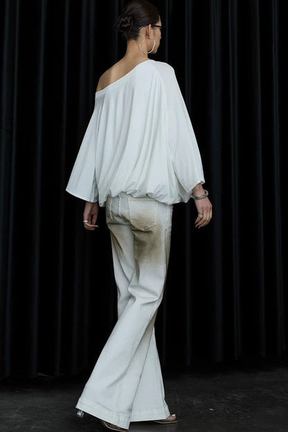 Blusa floreale con maniche a sbuffo e spalle scoperte