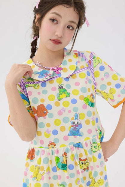 Robe blanc cassé à pois et graffiti