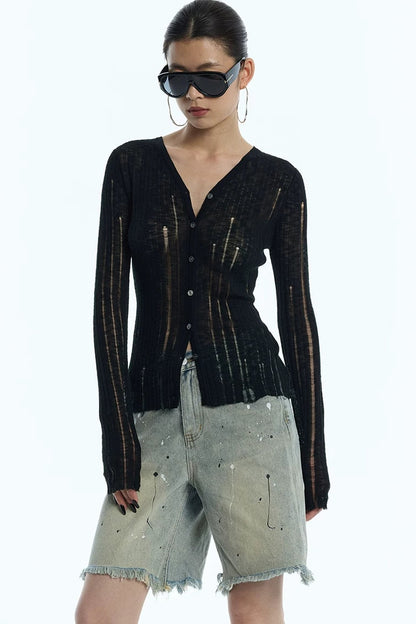 Cardigan en maille noir rayé à découpes