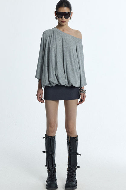 Blusa floreale con maniche a sbuffo e spalle scoperte