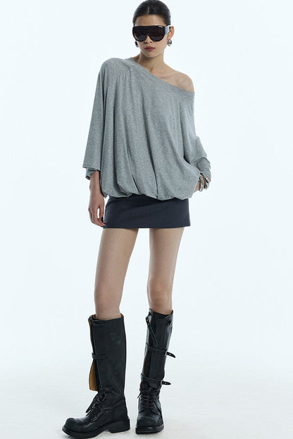 Blusa floreale con maniche a sbuffo e spalle scoperte