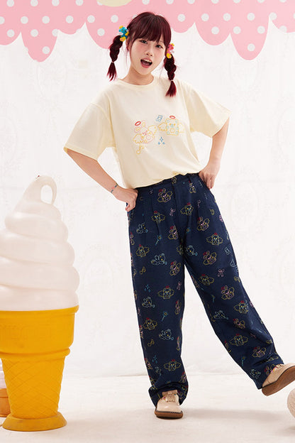 Jeans con ricami importanti di animali e angeli