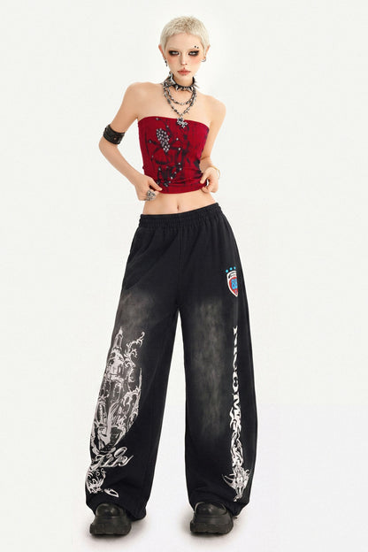 Pantaloni sportivi a gamba larga con stampa grafica