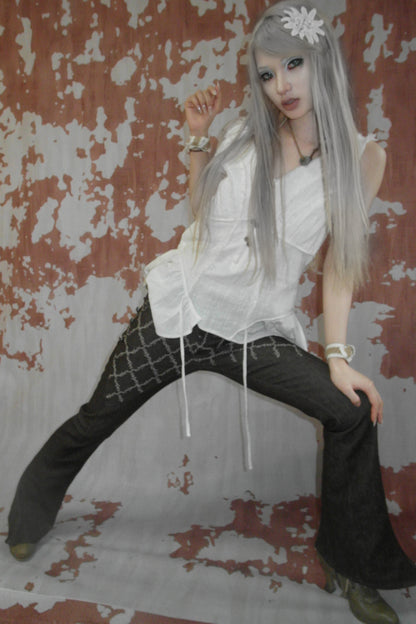 Pantalon évasé en denim patchwork médiéval