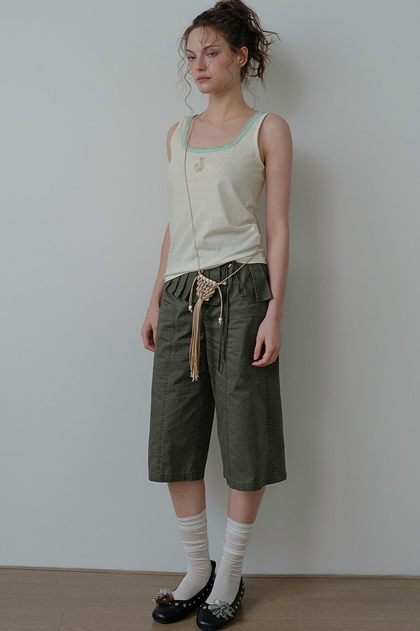 Pantaloni cropped a vita alta con orlo plissettato staccabile