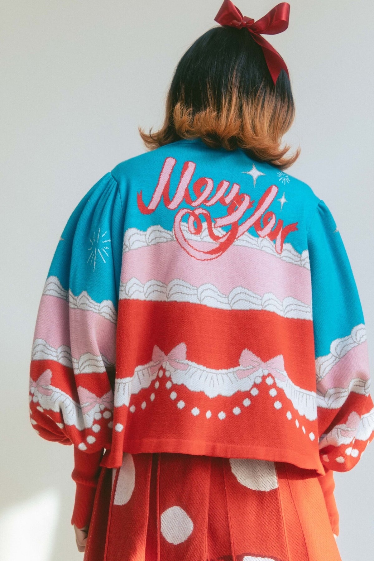 Cardigan a maglia con fiocco e coniglio