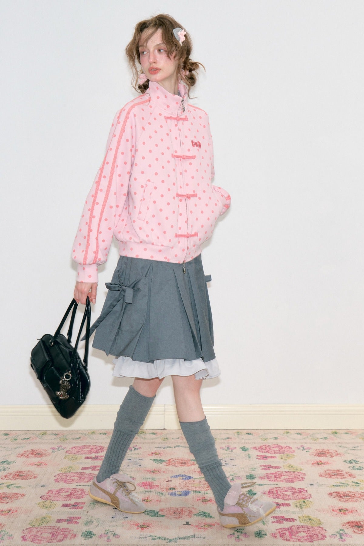 Giacca rosa a pois con zip