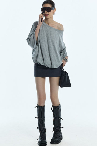 Blusa floreale con maniche a sbuffo e spalle scoperte
