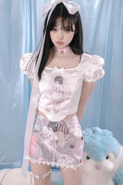 Blusa con stampa angeli e maniche a sbuffo