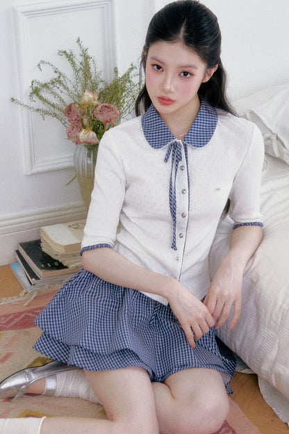 Completo cardigan a maglia bianco con colletto a quadri