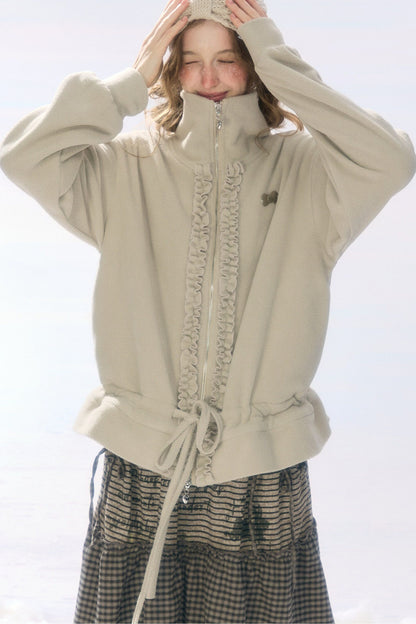 Veste en polaire grise et abricot à fermeture zippée et cordon de serrage