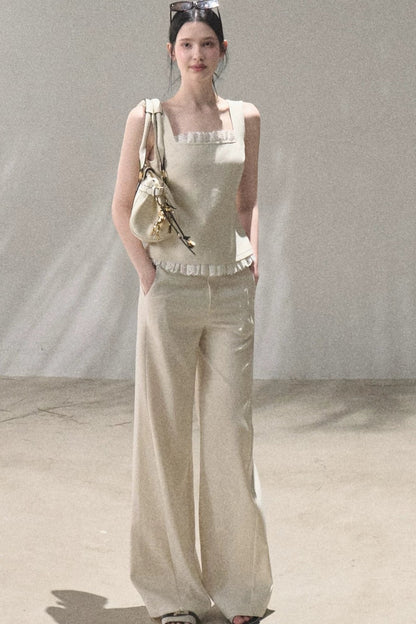 Set coordinato gilet e pantaloni in lino con inserti in pizzo