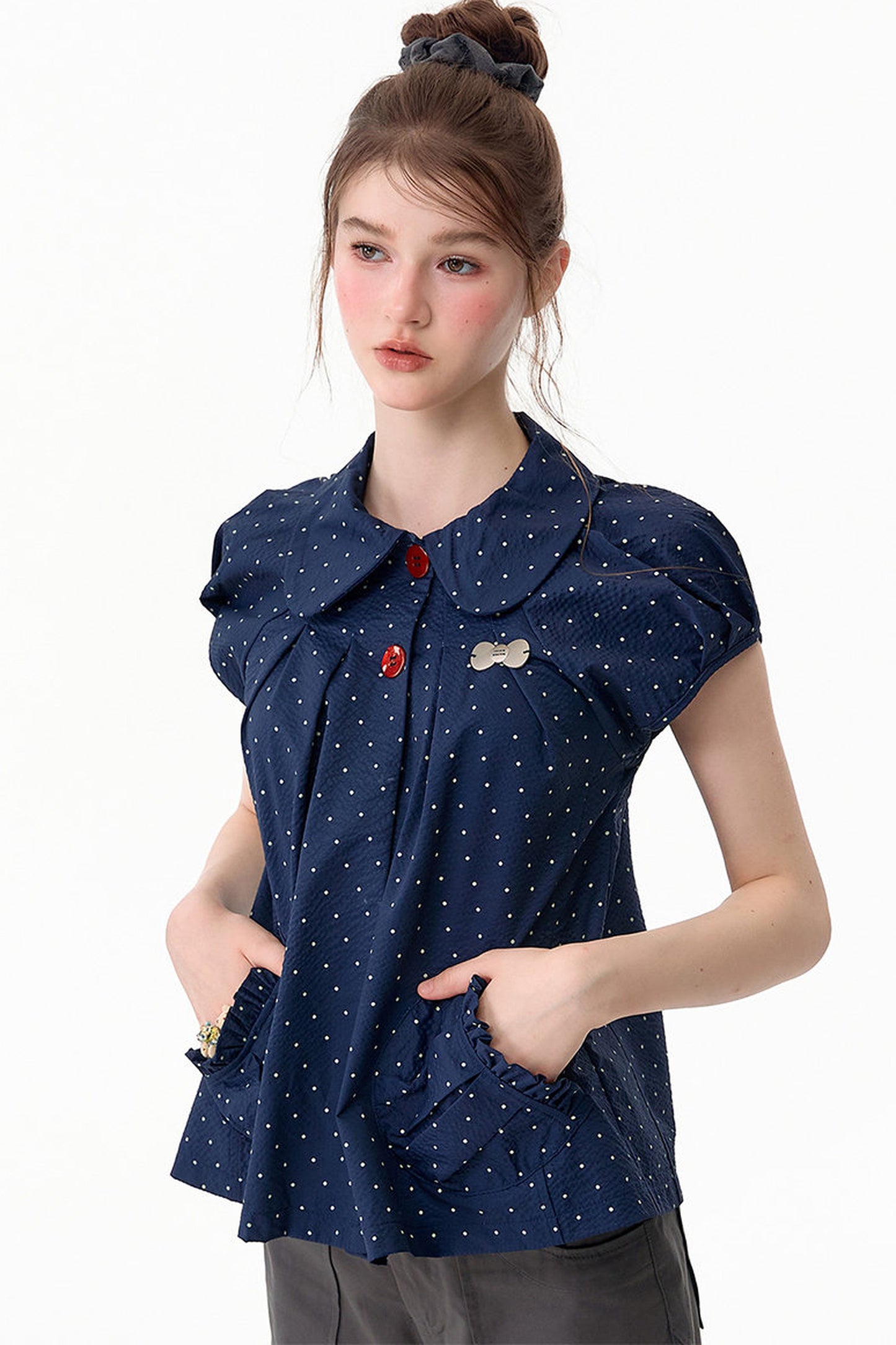 Camicia blu scuro a pois con colletto Peter Pan
