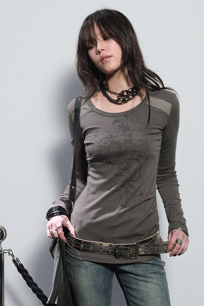 Top in mesh bicolore con strass