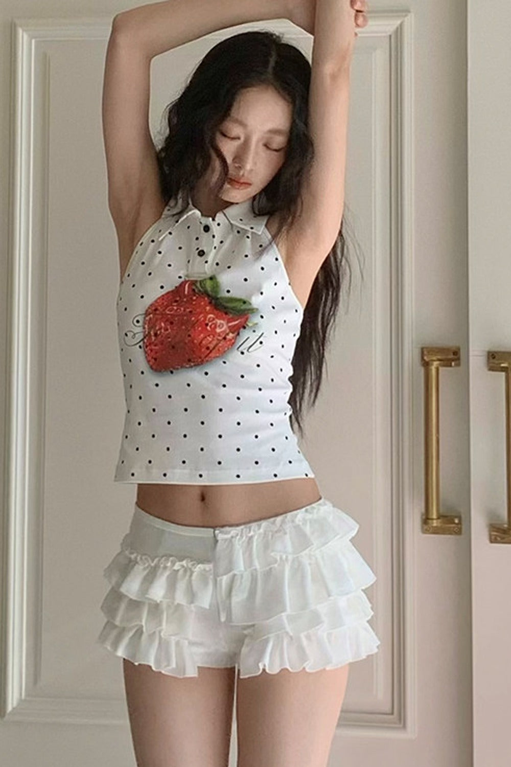 Top a canotta all'americana con schiena scoperta a pois fragola