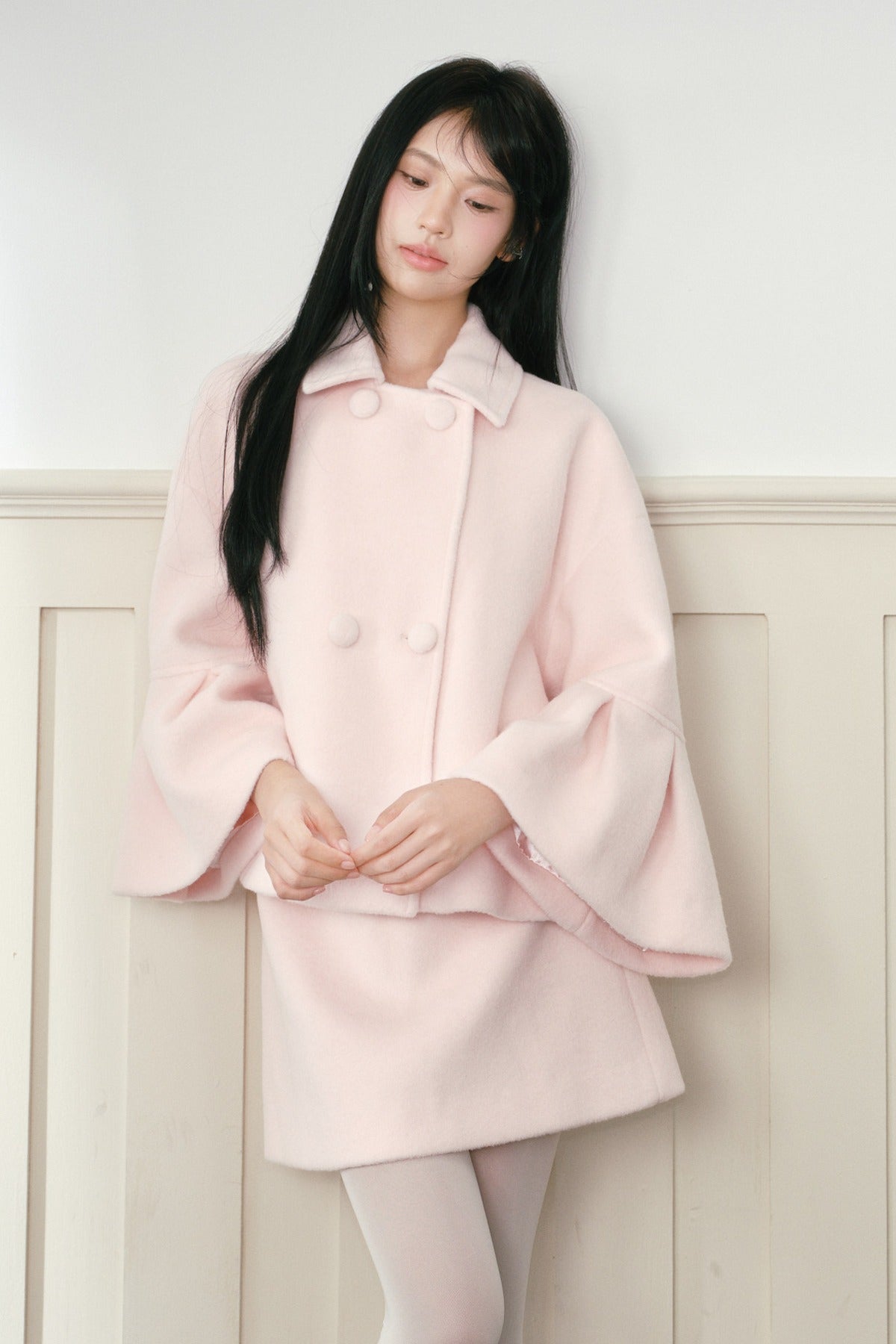 Completo cappotto e gonna in lana rosa
