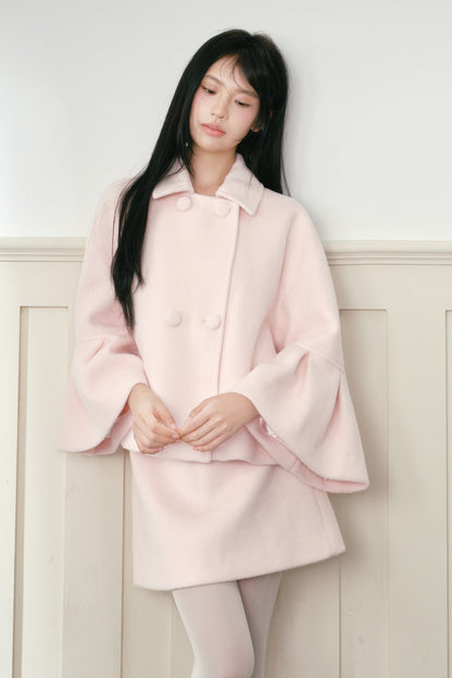 Completo cappotto e gonna in lana rosa