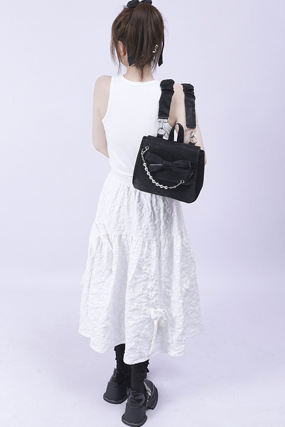 Silver Bow Crossbody Backpack