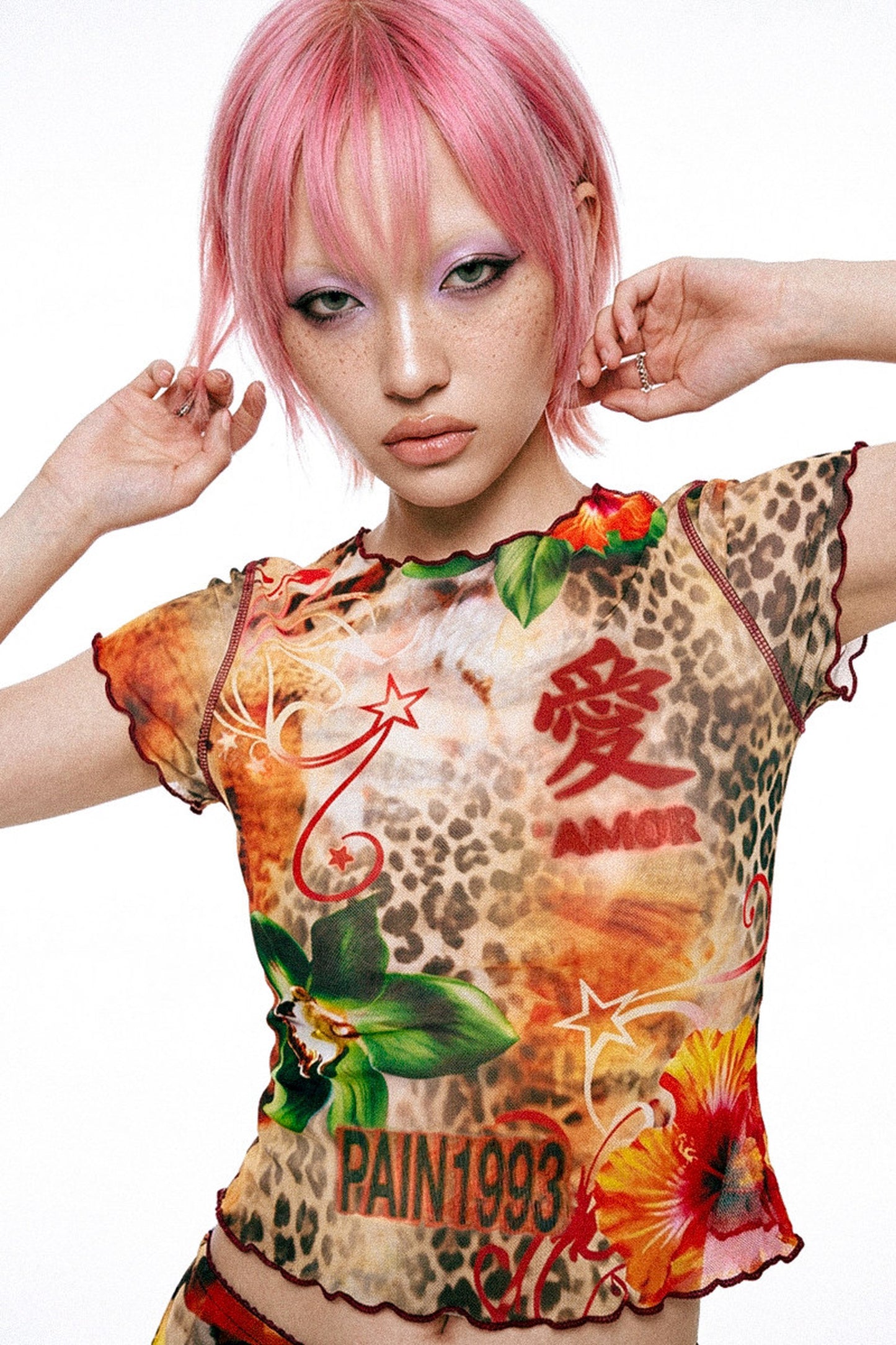 Completo con gonna a sirena in tessuto a rete con stampa leopardata