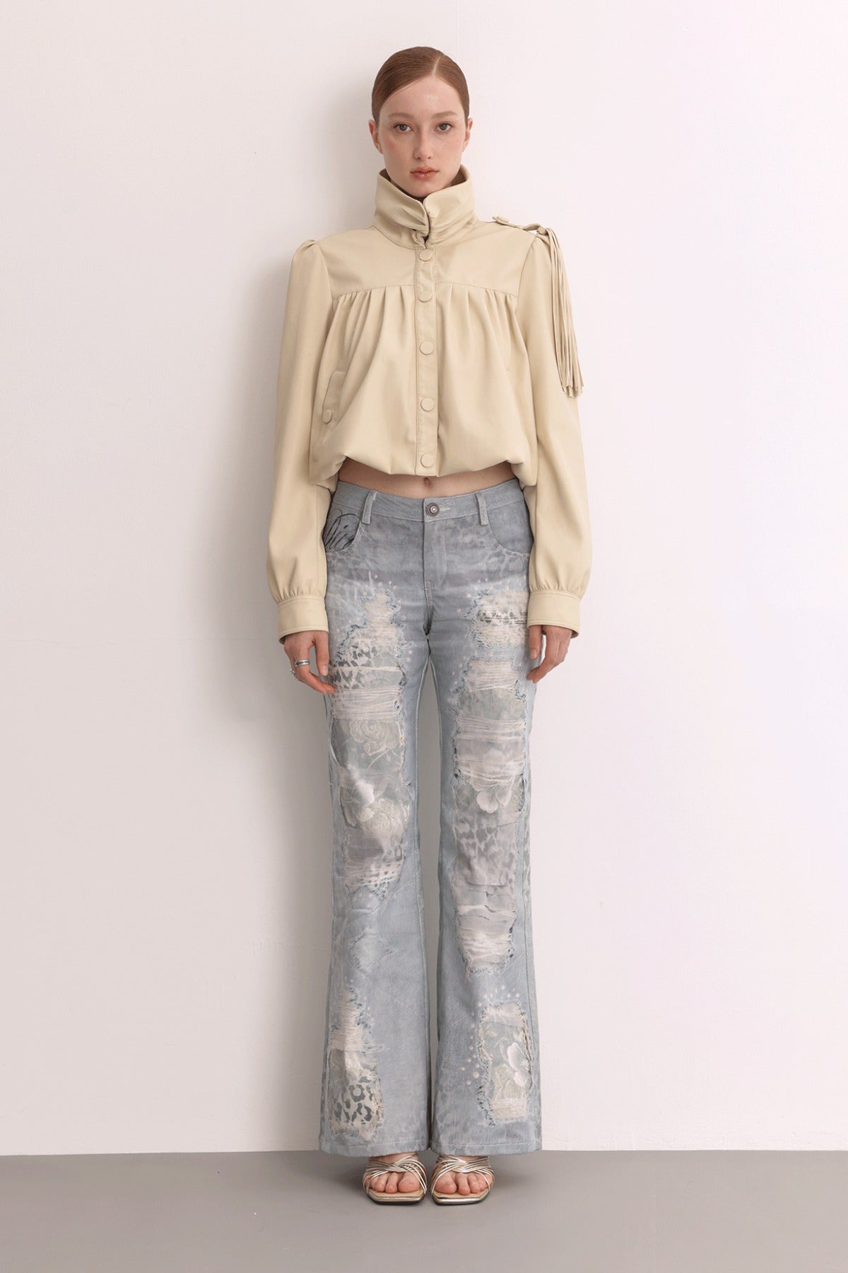 Jeans in mesh leopardato slavato a doppio strato