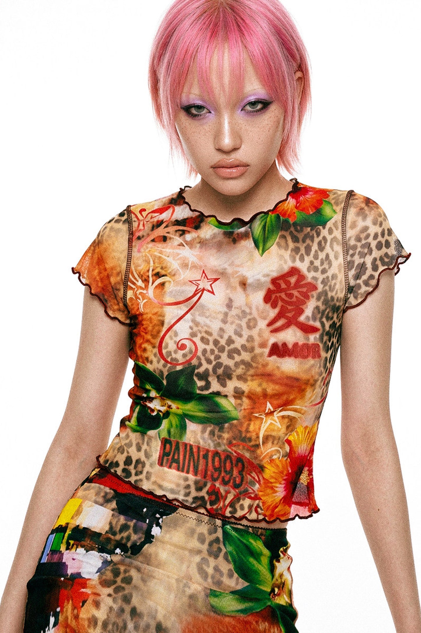 Completo con gonna a sirena in tessuto a rete con stampa leopardata