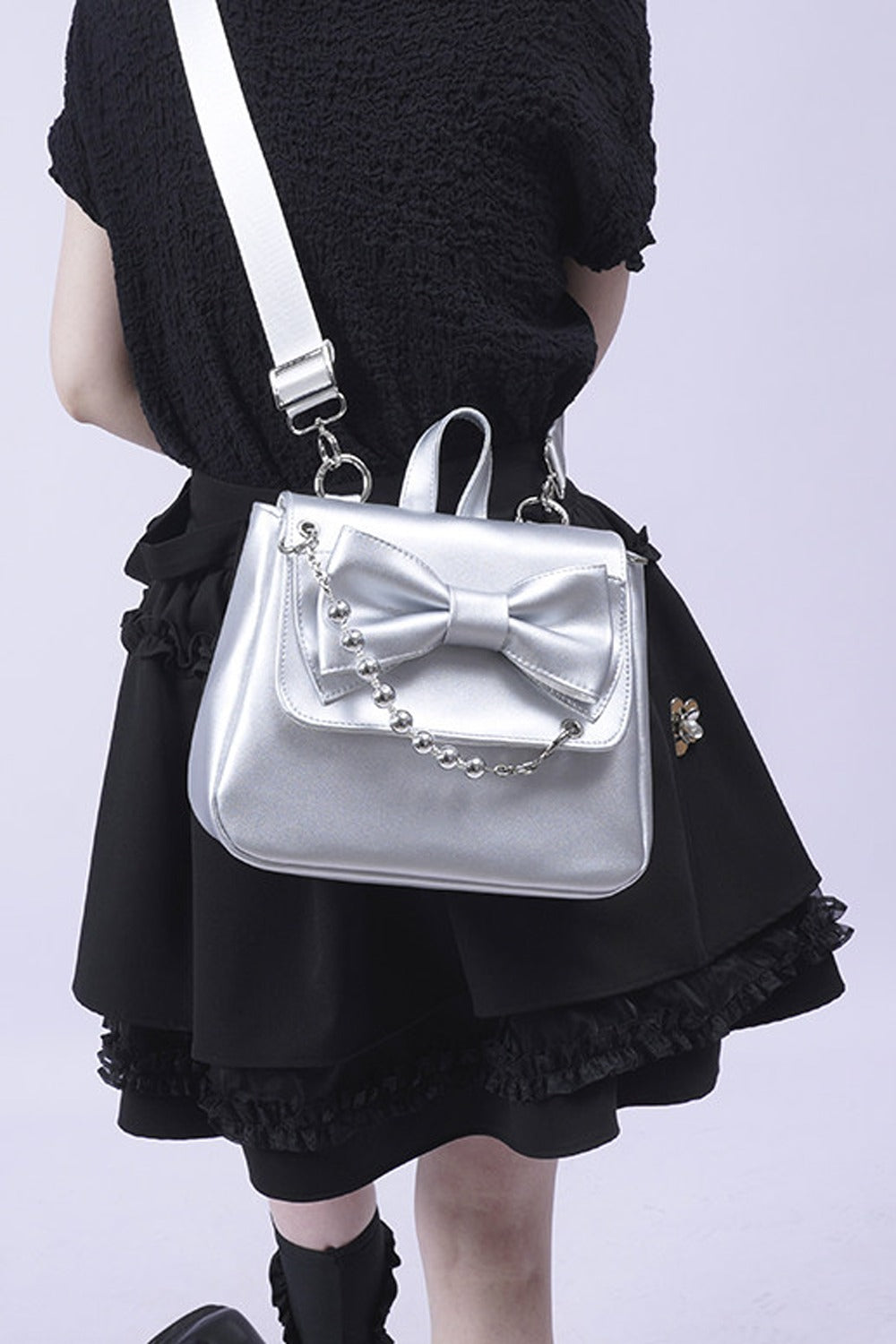 Silver Bow Crossbody Backpack