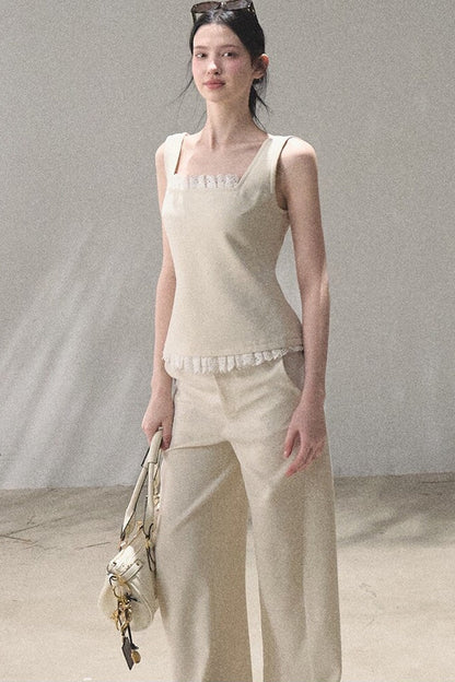 Set coordinato gilet e pantaloni in lino con inserti in pizzo