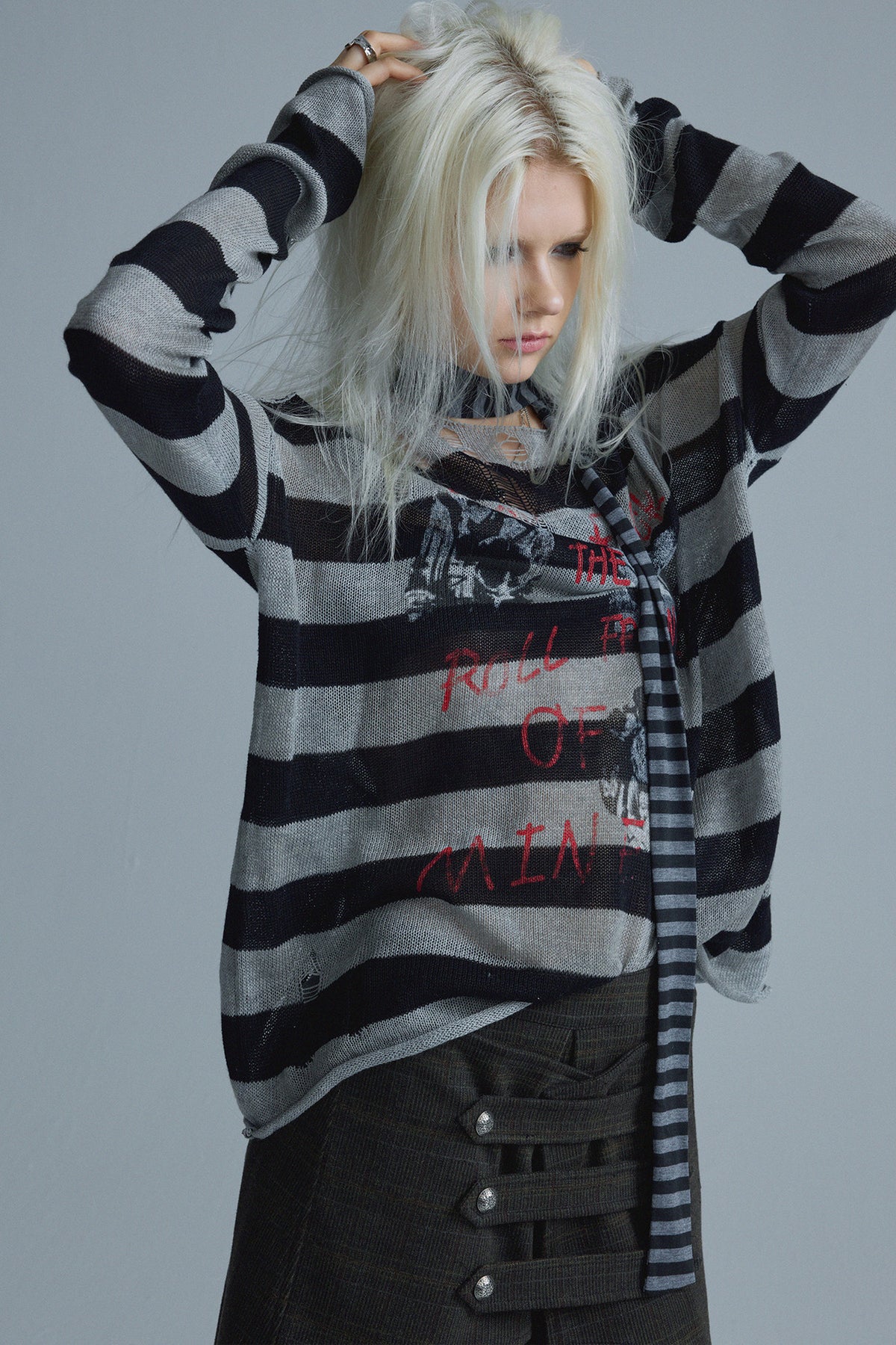 Top in maglia a righe punk a maniche lunghe