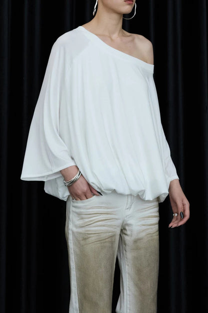 Blusa floreale con maniche a sbuffo e spalle scoperte