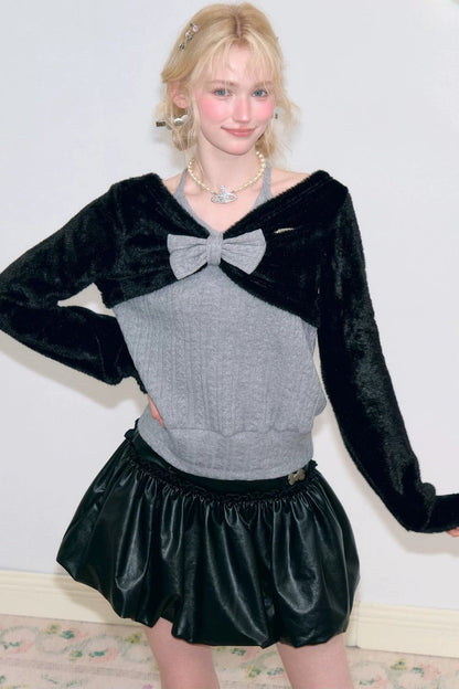 Maglione grigio in maglia con fiocco e scollo all'americana