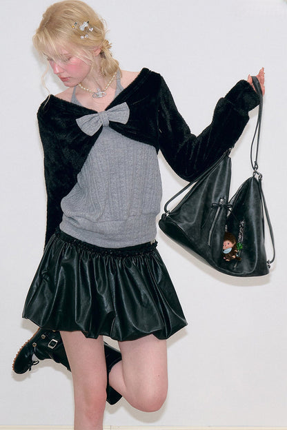 Maglione grigio in maglia con fiocco e scollo all'americana