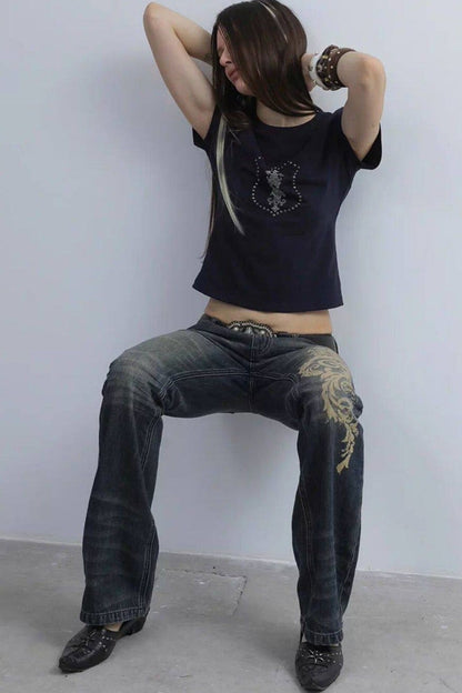 Distressed Baroque Flared Jeans