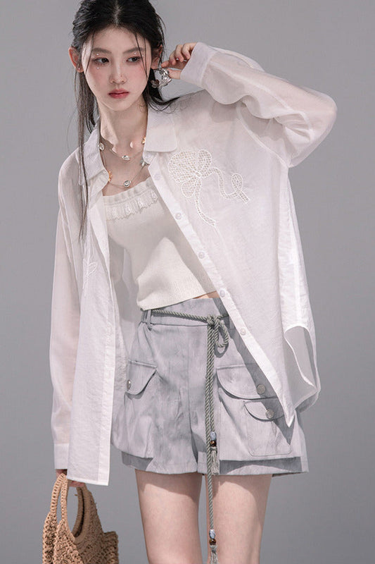 Transparente bestickte Seidenbluse