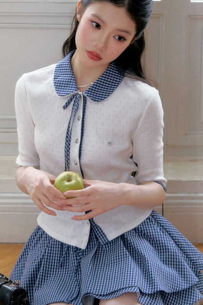 Completo cardigan a maglia bianco con colletto a quadri