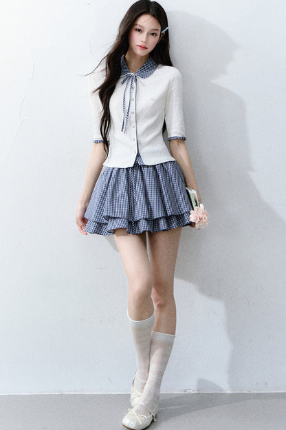 Completo cardigan a maglia bianco con colletto a quadri