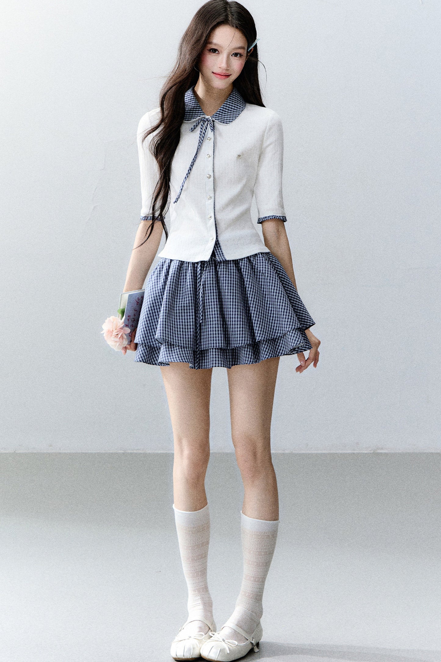 Completo cardigan a maglia bianco con colletto a quadri