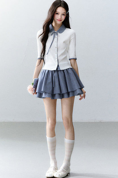 Completo cardigan a maglia bianco con colletto a quadri