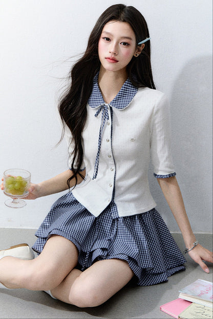 Completo cardigan a maglia bianco con colletto a quadri