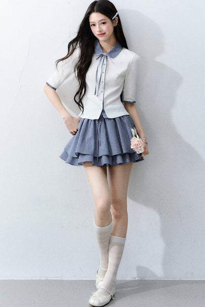 Completo cardigan a maglia bianco con colletto a quadri