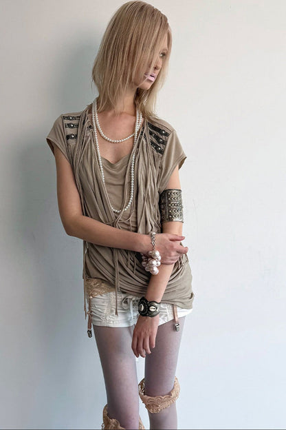 Top in maglia drappeggiato con nappine