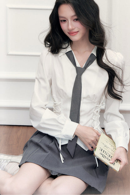 Ensemble blouse à nœud coulissant et jupe