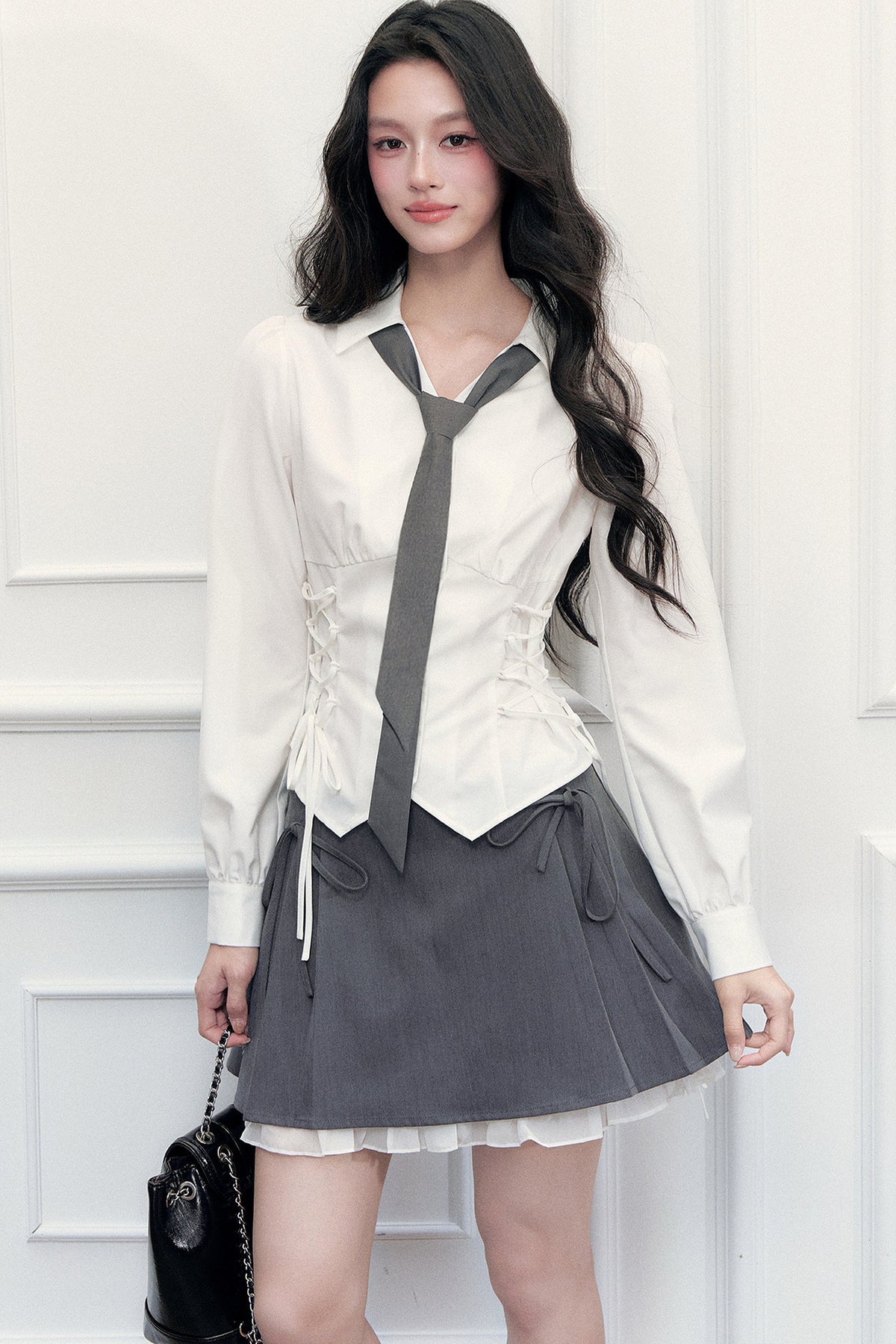 Ensemble blouse à nœud coulissant et jupe