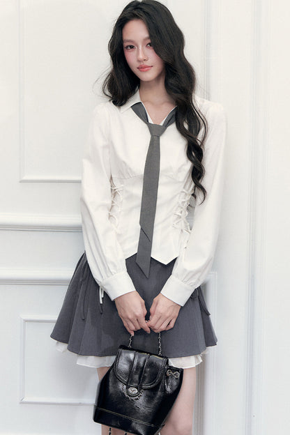 Ensemble blouse à nœud coulissant et jupe
